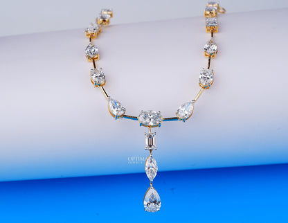 Exquisite Gold Necklace Adorned with Pear, Oval, and Rectangular Cut